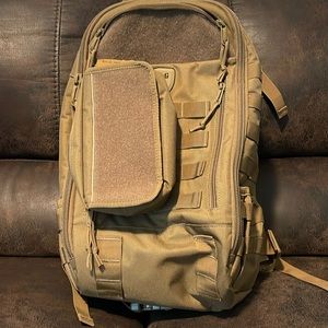 Coyote brown tactical baby gear backpack.